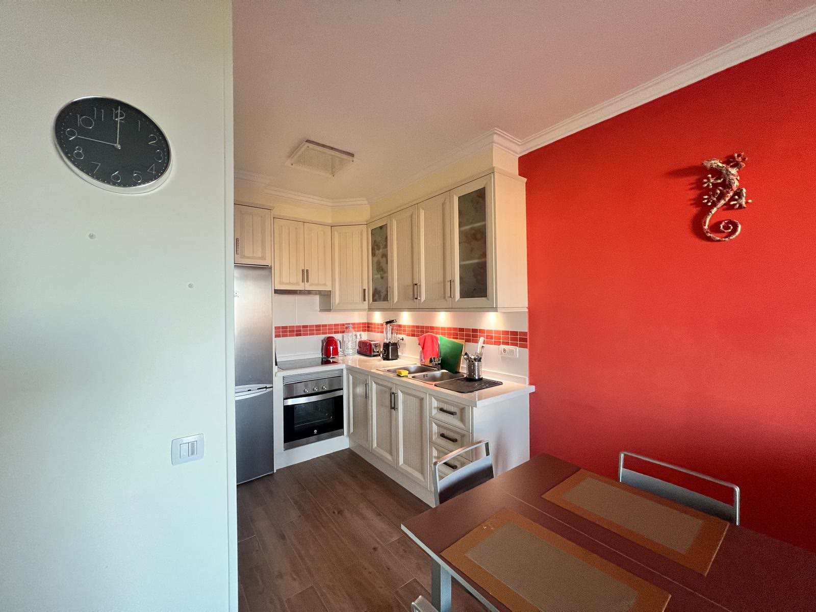 Fully equipped kitchen and dining area